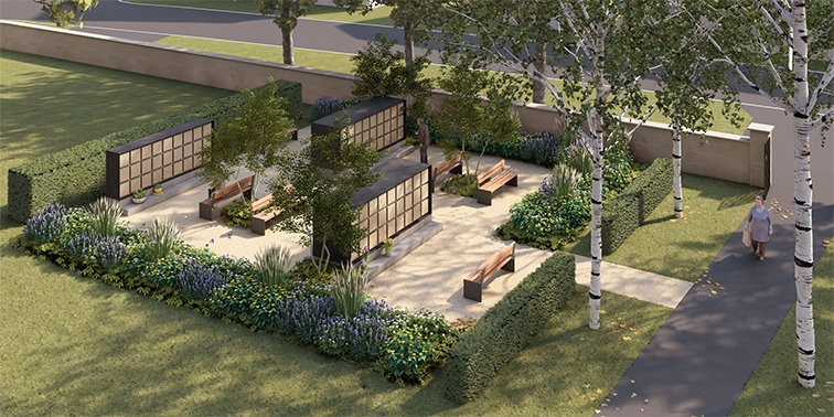 Ein gepflegter Gedenkgarten mit Kolumbarien, Bänken und blühenden Pflanzen lädt zum stillen Verweilen ein.