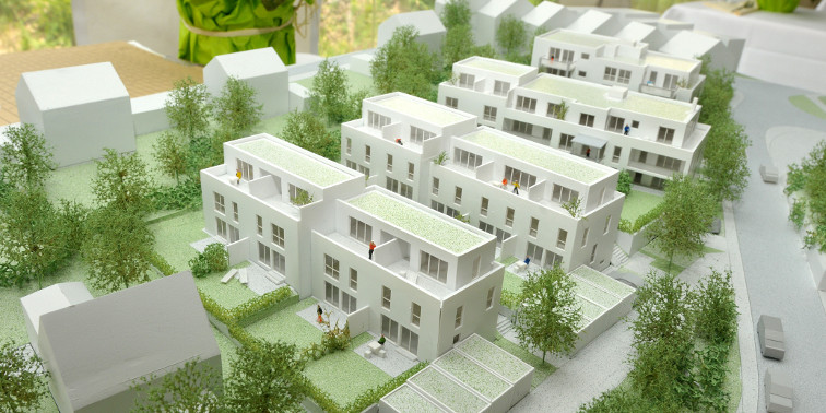 Architekturmodell zeigt Entwurf einer geplanten Wohnhausanlage